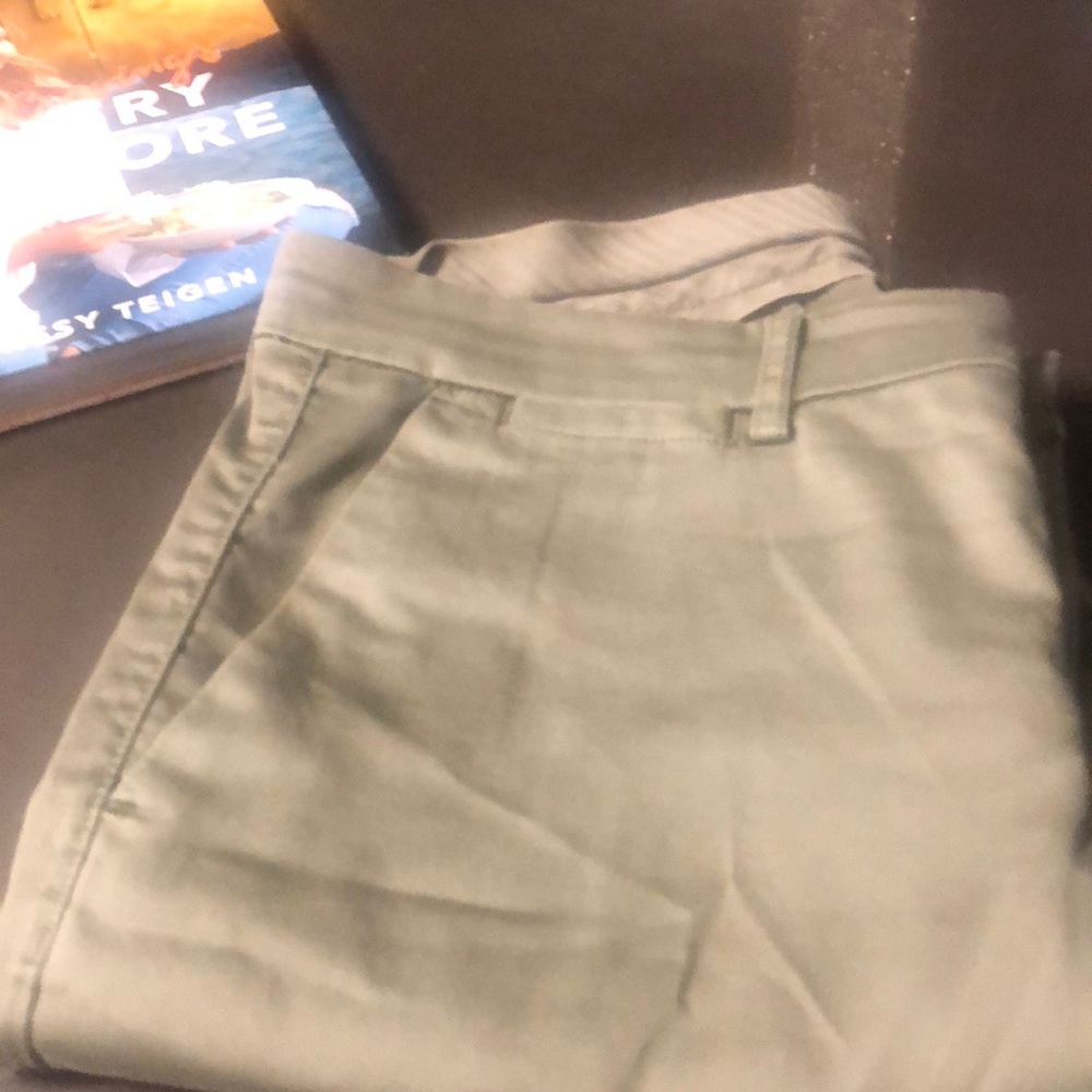 Trousers khakis type with jacket listed too.